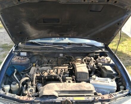 Синий Мазда 626, объемом двигателя 2 л и пробегом 285 тыс. км за 1900 $, фото 2 на Automoto.ua