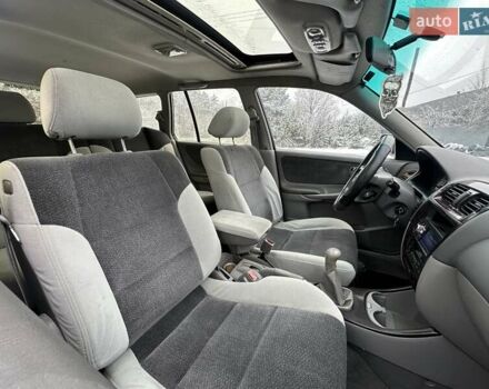 Синій Мазда 626, об'ємом двигуна 2 л та пробігом 294 тис. км за 1999 $, фото 7 на Automoto.ua