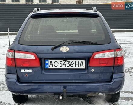 Синій Мазда 626, об'ємом двигуна 2 л та пробігом 294 тис. км за 1999 $, фото 4 на Automoto.ua