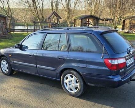 Синий Мазда 626, объемом двигателя 2 л и пробегом 290 тыс. км за 2900 $, фото 2 на Automoto.ua