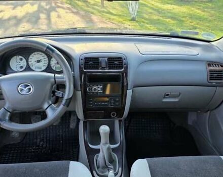 Синий Мазда 626, объемом двигателя 2 л и пробегом 290 тыс. км за 2900 $, фото 5 на Automoto.ua