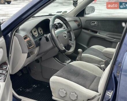 Синій Мазда 626, об'ємом двигуна 2 л та пробігом 294 тис. км за 1999 $, фото 6 на Automoto.ua