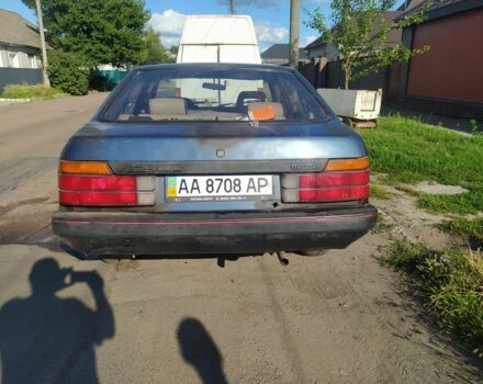 Синий Мазда 626, объемом двигателя 2 л и пробегом 295 тыс. км за 950 $, фото 1 на Automoto.ua