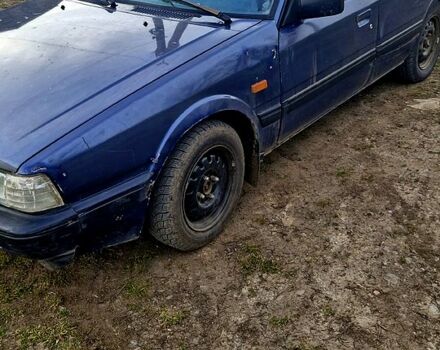 Синий Мазда 626, объемом двигателя 2 л и пробегом 0 тыс. км за 1000 $, фото 1 на Automoto.ua