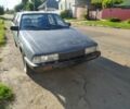Синий Мазда 626, объемом двигателя 2 л и пробегом 295 тыс. км за 950 $, фото 1 на Automoto.ua