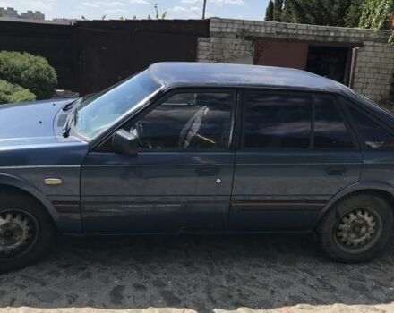 Синій Мазда 626, об'ємом двигуна 2 л та пробігом 350 тис. км за 1290 $, фото 5 на Automoto.ua