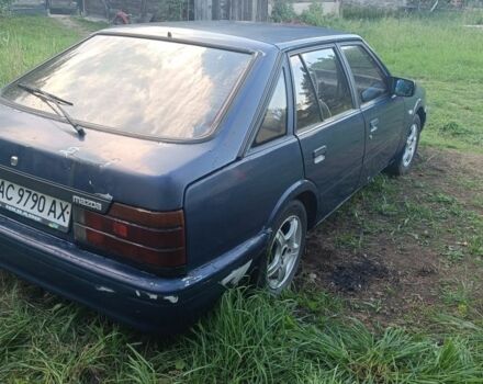 Синій Мазда 626, об'ємом двигуна 2 л та пробігом 480 тис. км за 22500 $, фото 1 на Automoto.ua