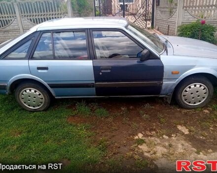 Синий Мазда 626, объемом двигателя 2 л и пробегом 0 тыс. км за 850 $, фото 1 на Automoto.ua