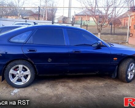 Синій Мазда 626, об'ємом двигуна 1.8 л та пробігом 200 тис. км за 1750 $, фото 11 на Automoto.ua