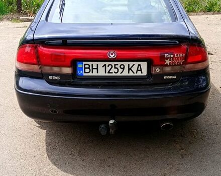 Синій Мазда 626, об'ємом двигуна 1.8 л та пробігом 200 тис. км за 1750 $, фото 5 на Automoto.ua