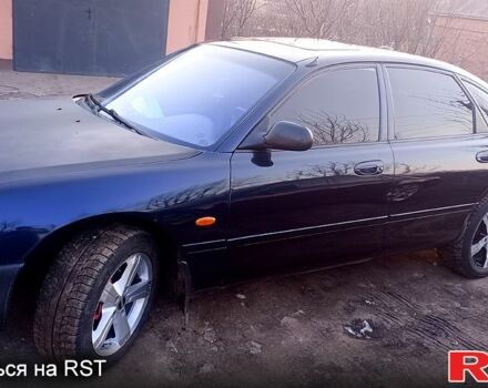 Синій Мазда 626, об'ємом двигуна 1.8 л та пробігом 200 тис. км за 1750 $, фото 12 на Automoto.ua