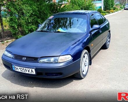 Синій Мазда 626, об'ємом двигуна 1.8 л та пробігом 200 тис. км за 1750 $, фото 1 на Automoto.ua