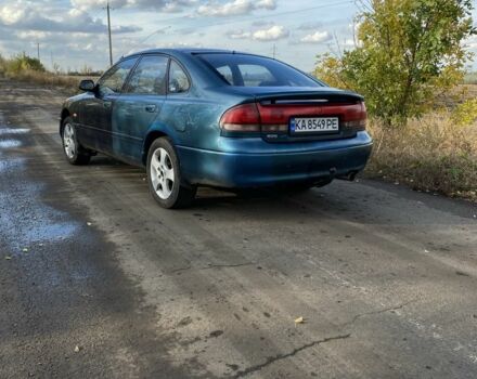 Синий Мазда 626, объемом двигателя 2 л и пробегом 325 тыс. км за 1790 $, фото 1 на Automoto.ua