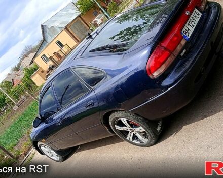 Синій Мазда 626, об'ємом двигуна 1.8 л та пробігом 200 тис. км за 1750 $, фото 4 на Automoto.ua