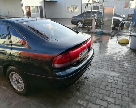 Синий Мазда 626, объемом двигателя 2 л и пробегом 460 тыс. км за 800 $, фото 5 на Automoto.ua