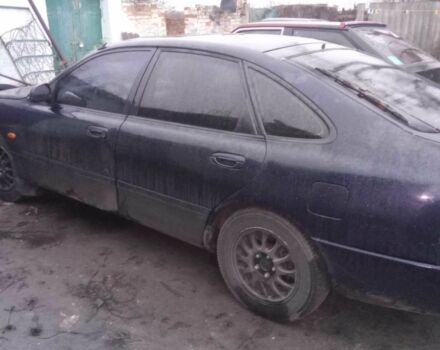 Синий Мазда 626, объемом двигателя 1.9 л и пробегом 3 тыс. км за 2000 $, фото 4 на Automoto.ua