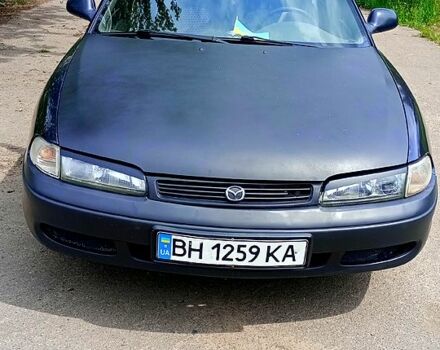 Синій Мазда 626, об'ємом двигуна 1.8 л та пробігом 200 тис. км за 1750 $, фото 7 на Automoto.ua