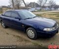 Синий Мазда 626, объемом двигателя 1.8 л и пробегом 300 тыс. км за 1600 $, фото 2 на Automoto.ua