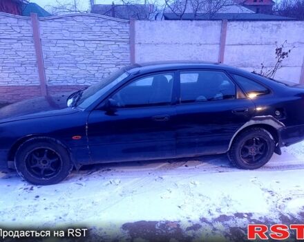 Синий Мазда 626, объемом двигателя 1.8 л и пробегом 1 тыс. км за 1800 $, фото 2 на Automoto.ua