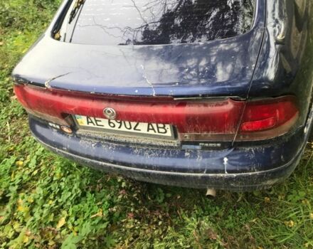 Синій Мазда 626, об'ємом двигуна 1.8 л та пробігом 214 тис. км за 599 $, фото 2 на Automoto.ua