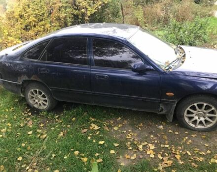 Синій Мазда 626, об'ємом двигуна 1.8 л та пробігом 214 тис. км за 599 $, фото 3 на Automoto.ua