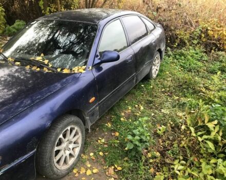 Синій Мазда 626, об'ємом двигуна 1.8 л та пробігом 214 тис. км за 599 $, фото 1 на Automoto.ua