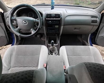 Синій Мазда 626, об'ємом двигуна 2 л та пробігом 258 тис. км за 1500 $, фото 10 на Automoto.ua