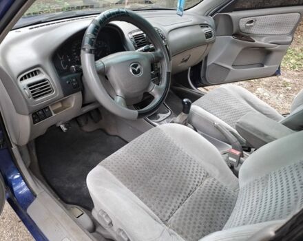 Синій Мазда 626, об'ємом двигуна 2 л та пробігом 258 тис. км за 1500 $, фото 9 на Automoto.ua