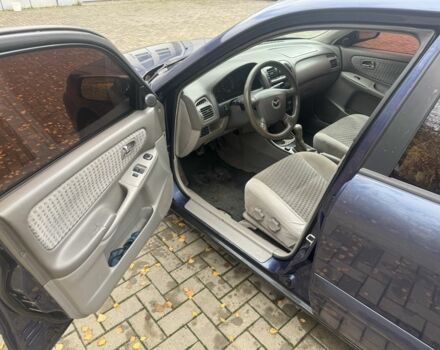 Синий Мазда 626, объемом двигателя 1.8 л и пробегом 346 тыс. км за 1500 $, фото 4 на Automoto.ua