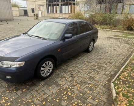 Синий Мазда 626, объемом двигателя 1.8 л и пробегом 346 тыс. км за 1500 $, фото 3 на Automoto.ua