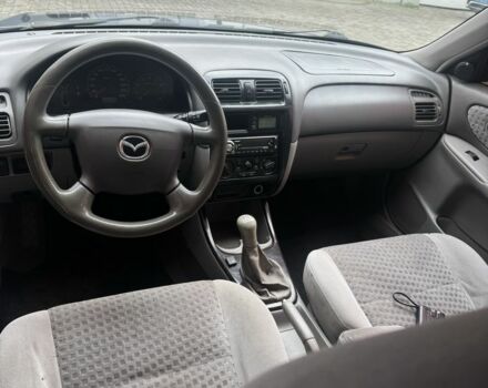 Синий Мазда 626, объемом двигателя 1.8 л и пробегом 346 тыс. км за 1500 $, фото 5 на Automoto.ua