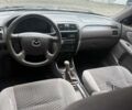 Синий Мазда 626, объемом двигателя 1.8 л и пробегом 346 тыс. км за 1500 $, фото 5 на Automoto.ua