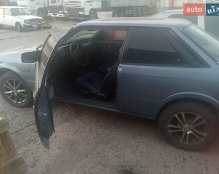 Синий Мазда 626, объемом двигателя 2 л и пробегом 111 тыс. км за 1000 $, фото 1 на Automoto.ua