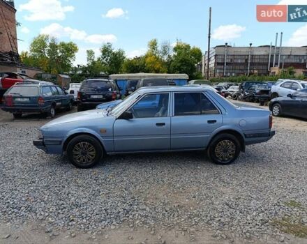 Синій Мазда 626, об'ємом двигуна 2 л та пробігом 350 тис. км за 800 $, фото 1 на Automoto.ua