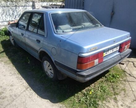 Синий Мазда 626, объемом двигателя 1.6 л и пробегом 300 тыс. км за 700 $, фото 1 на Automoto.ua