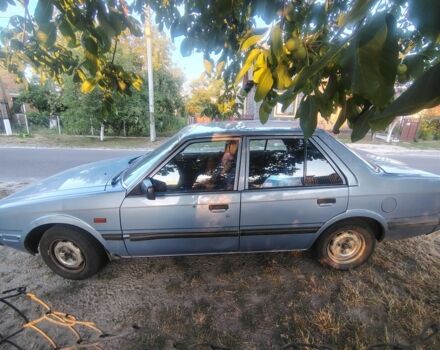 Синий Мазда 626, объемом двигателя 2 л и пробегом 319 тыс. км за 1002 $, фото 1 на Automoto.ua