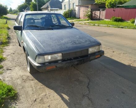 Синий Мазда 626, объемом двигателя 2 л и пробегом 295 тыс. км за 950 $, фото 1 на Automoto.ua