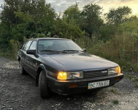 Синий Мазда 626, объемом двигателя 2 л и пробегом 500 тыс. км за 1300 $, фото 1 на Automoto.ua