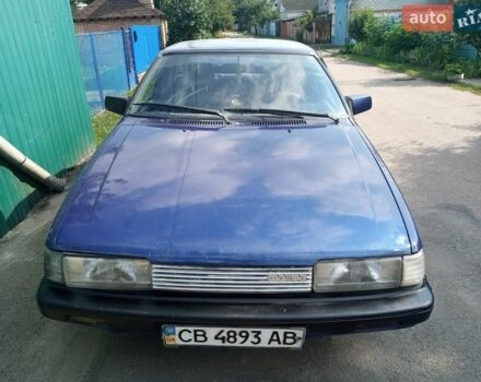 Синій Мазда 626, об'ємом двигуна 1.6 л та пробігом 400 тис. км за 450 $, фото 1 на Automoto.ua