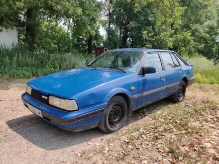 Синій Мазда 626, об'ємом двигуна 2 л та пробігом 290 тис. км за 585 $, фото 1 на Automoto.ua