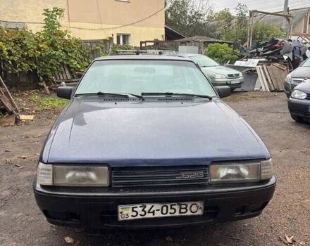 Синий Мазда 626, объемом двигателя 2 л и пробегом 400 тыс. км за 700 $, фото 1 на Automoto.ua