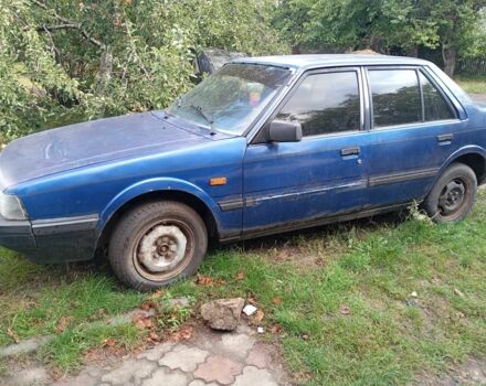 Синій Мазда 626, об'ємом двигуна 2 л та пробігом 200 тис. км за 700 $, фото 1 на Automoto.ua