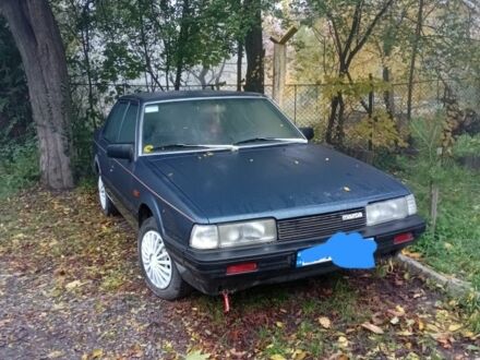 Синий Мазда 626, объемом двигателя 2 л и пробегом 280 тыс. км за 1500 $, фото 1 на Automoto.ua