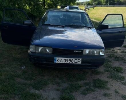 Синий Мазда 626, объемом двигателя 2 л и пробегом 1 тыс. км за 670 $, фото 1 на Automoto.ua