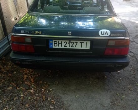 Синий Мазда 626, объемом двигателя 1.6 л и пробегом 157 тыс. км за 1500 $, фото 1 на Automoto.ua