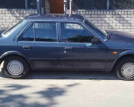 Синий Мазда 626, объемом двигателя 1.6 л и пробегом 159 тыс. км за 1205 $, фото 1 на Automoto.ua