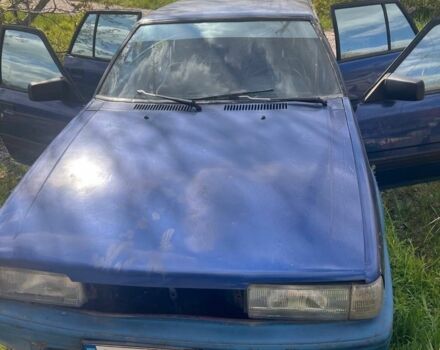 Синий Мазда 626, объемом двигателя 2 л и пробегом 200 тыс. км за 338 $, фото 1 на Automoto.ua