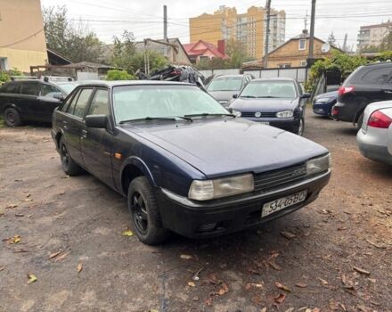 Синий Мазда 626, объемом двигателя 2 л и пробегом 508 тыс. км за 666 $, фото 1 на Automoto.ua