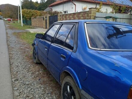 Синий Мазда 626, объемом двигателя 2 л и пробегом 1000 тыс. км за 400 $, фото 1 на Automoto.ua