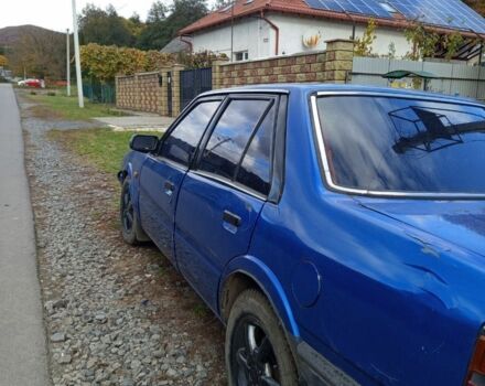 Синий Мазда 626, объемом двигателя 2 л и пробегом 1000 тыс. км за 400 $, фото 1 на Automoto.ua